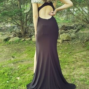 MacDuggall Black Rhinestone off shoulder gown with slit on side